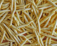 Maccheroncini also known as Maccheroni al ferretto, is a typical pasta of Calabrian tradition widespread in many southern regions. Close up view of handmade italian pasta on a wooden table.