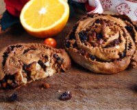 Italian food - the pitta 'mpigliata or pitta 'nchiusa, a traditional calabrian christmas sweet with cinnamon, raisins, candied fruit, honey, walnuts, almonds, hard wheat pastry.